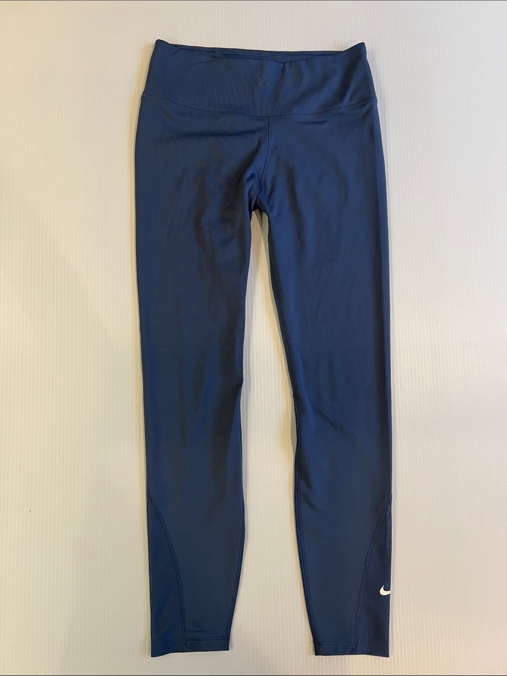 Nike Women’s Navy Leggings with Mesh Material at Ankle Hem in Size Small